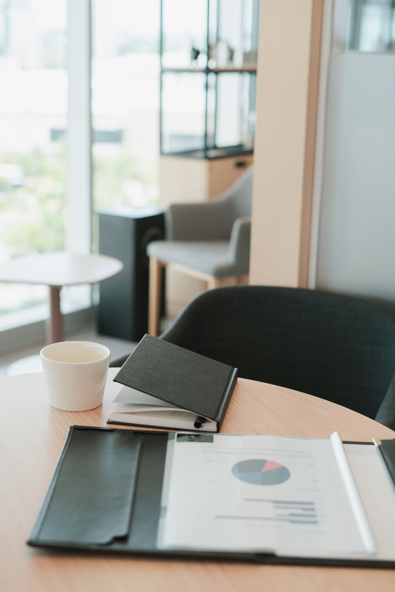 Executive planning desk with strategy documents and performance charts